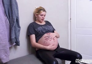 Lingerie-wearing blonde shows her soft belly here